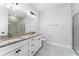 Double vanity bathroom with granite countertop at 405 N Mcdonald Ave, Deland, FL 32724