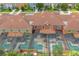 Aerial view showcasing multiple townhouses and pools at 2955 Banana Palm Dr, Kissimmee, FL 34747