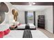 Mickey Mouse themed bedroom with two twin beds, nightstands, and a TV at 2955 Banana Palm Dr, Kissimmee, FL 34747
