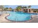 Inviting community pool with waterslide and waterfall at 2955 Banana Palm Dr, Kissimmee, FL 34747