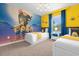 Twin-size bedroom with Minions theme and bright decor at 2955 Banana Palm Dr, Kissimmee, FL 34747