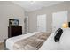 King-size bedroom with large window and built-in TV at 2955 Banana Palm Dr, Kissimmee, FL 34747