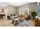Spacious living room with comfortable seating and large windows at 2955 Banana Palm Dr, Kissimmee, FL 34747