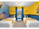 Twin-size bedroom with Minions theme and bright decor at 2955 Banana Palm Dr, Kissimmee, FL 34747