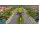 Gated community entrance with landscaped landscaping at 2955 Banana Palm Dr, Kissimmee, FL 34747