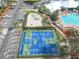 Outdoor basketball court near the pool and parking at 2338 Silver Palm Dr, Kissimmee, FL 34747