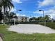 Outdoor sand volleyball court with surrounding landscaping at 2338 Silver Palm Dr, Kissimmee, FL 34747