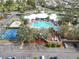 Aerial view of community center with pool and courts at 2338 Silver Palm Dr, Kissimmee, FL 34747