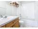Clean bathroom with tub shower, vanity, and tiled floor at 2338 Silver Palm Dr, Kissimmee, FL 34747