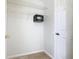 Large closet with wire shelving and a built-in safe at 2338 Silver Palm Dr, Kissimmee, FL 34747