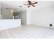 Kitchen features a breakfast bar and white cabinets at 2338 Silver Palm Dr, Kissimmee, FL 34747