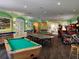 Community game room featuring pool table, ping pong, and arcade games at 2338 Silver Palm Dr, Kissimmee, FL 34747