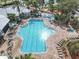 Large community pool with plenty of lounge chairs at 2338 Silver Palm Dr, Kissimmee, FL 34747