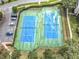 Two well-maintained tennis courts at 2338 Silver Palm Dr, Kissimmee, FL 34747