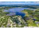 Wide aerial view of lakefront community at 693 Charrice Pl, Sanford, FL 32771