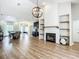 Spacious living room with fireplace and hardwood floors at 693 Charrice Pl, Sanford, FL 32771
