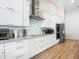 Modern kitchen with stainless steel appliances and white cabinets at 693 Charrice Pl, Sanford, FL 32771