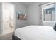 Bedroom with ensuite bathroom and window view at 7740 Sandy Ridge Dr # 218, Reunion, FL 34747