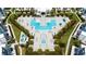 Large community pool with hot tub and surrounding patio at 7740 Sandy Ridge Dr # 218, Reunion, FL 34747