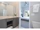 Modern double vanity bathroom with ensuite access at 7740 Sandy Ridge Dr # 218, Reunion, FL 34747