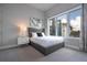 Cozy bedroom with large window and comfortable bed at 7740 Sandy Ridge Dr # 218, Reunion, FL 34747