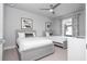 Bedroom with two twin beds, offering a shared bathroom nearby at 7740 Sandy Ridge Dr # 218, Reunion, FL 34747