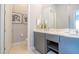 Elegant bathroom with double vanity and open toilet area at 7740 Sandy Ridge Dr # 218, Reunion, FL 34747