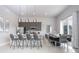 Modern kitchen with island and dining area at 7740 Sandy Ridge Dr # 218, Reunion, FL 34747