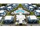 Aerial view of modern apartment community with pool and landscaped grounds at 7740 Sandy Ridge Dr # 218, Reunion, FL 34747