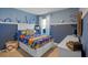 Fun bedroom with ocean-themed bedding and decor at 4145 Singing Mockingbird Blvd, Bartow, FL 33830