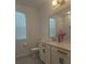 Main bathroom with double vanity and shower at 12500 Encore At Ovation Way, Winter Garden, FL 34787