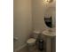 Clean and updated half bathroom with pedestal sink at 12500 Encore At Ovation Way, Winter Garden, FL 34787