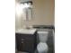 Bathroom with vanity, toilet, and updated fixtures at 16 N Lancelot Ave, Orlando, FL 32835