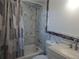 Updated bathroom with a shower/tub combo at 16 N Lancelot Ave, Orlando, FL 32835