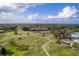 Community overview showing clubhouse and golf course at 38748 Lakeview Walk, Lady Lake, FL 32159