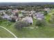 Beautiful home nestled on a spacious lot with mature trees at 38748 Lakeview Walk, Lady Lake, FL 32159
