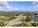 Scenic golf course with water features and lush landscape at 38748 Lakeview Walk, Lady Lake, FL 32159
