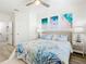 Spacious main bedroom with ocean-themed decor and ensuite bath at 2809 Almaton Loop # 304, Kissimmee, FL 34747