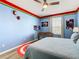 Marvel themed bedroom with king bed, foosball table, and TV at 2809 Almaton Loop # 304, Kissimmee, FL 34747