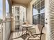 Private balcony with table and chairs at 2809 Almaton Loop # 304, Kissimmee, FL 34747