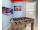 Fun game room, featuring foosball table and TV at 2809 Almaton Loop # 304, Kissimmee, FL 34747