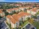 Aerial view of Windsor Hills Resort, showcasing building rooftops and surrounding landscape at 2809 Almaton Loop # 304, Kissimmee, FL 34747