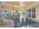 Covered patio with ping pong, comfortable seating, and cafe views at 2809 Almaton Loop # 304, Kissimmee, FL 34747