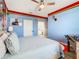 Spacious bedroom with a king-size bed and Marvel-themed decor at 2809 Almaton Loop # 304, Kissimmee, FL 34747