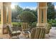 Relaxing outdoor patio seating area with a small table at 2809 Almaton Loop # 304, Kissimmee, FL 34747