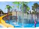 Colorful splash pad with slide and water features at 2809 Almaton Loop # 304, Kissimmee, FL 34747
