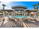 Pool area with shaded pergola and lounge chairs at 2809 Almaton Loop # 304, Kissimmee, FL 34747