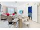 Light-filled dining area with a table set for six, and access to a themed bedroom at 2809 Almaton Loop # 304, Kissimmee, FL 34747