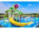 Brightly colored waterpark with a slide and spray features at 2809 Almaton Loop # 304, Kissimmee, FL 34747