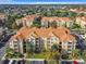 Aerial view of community, showing building and parking at 2809 Almaton Loop # 304, Kissimmee, FL 34747